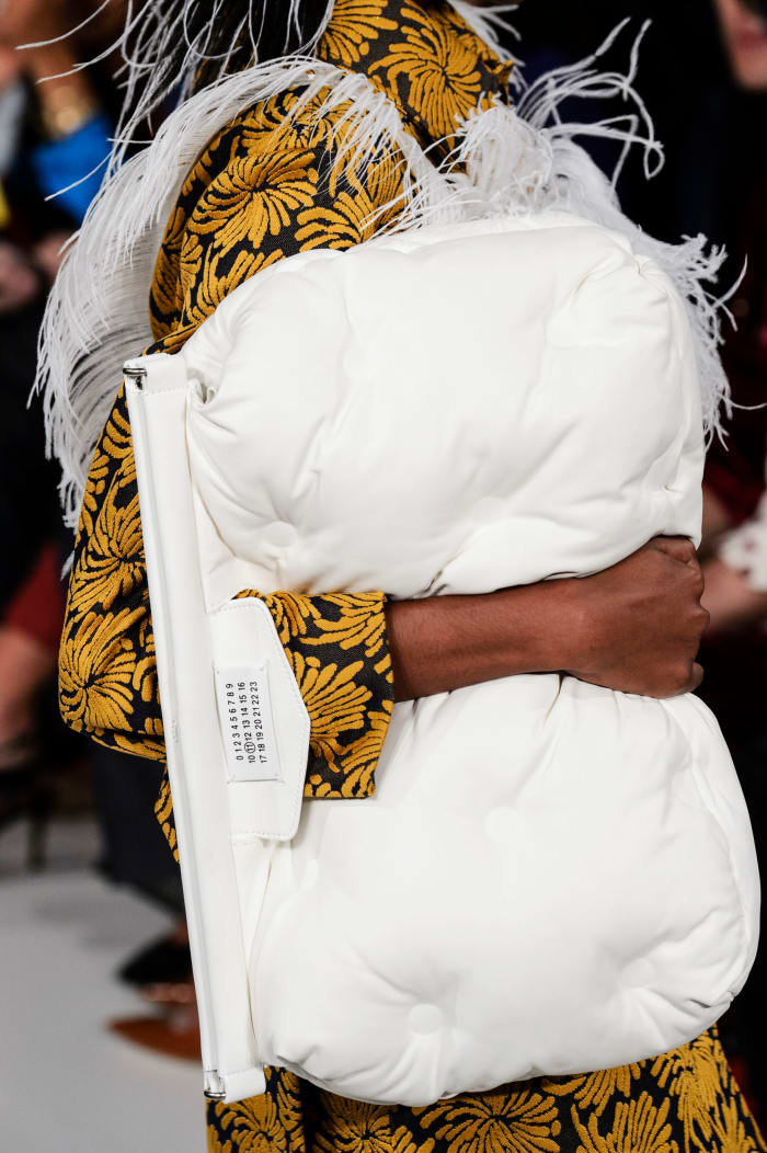 Maison Martin Margiela's Grand Slam pillow bags — seen here on the Spring 2018 runway — have also become a fashion favorite.