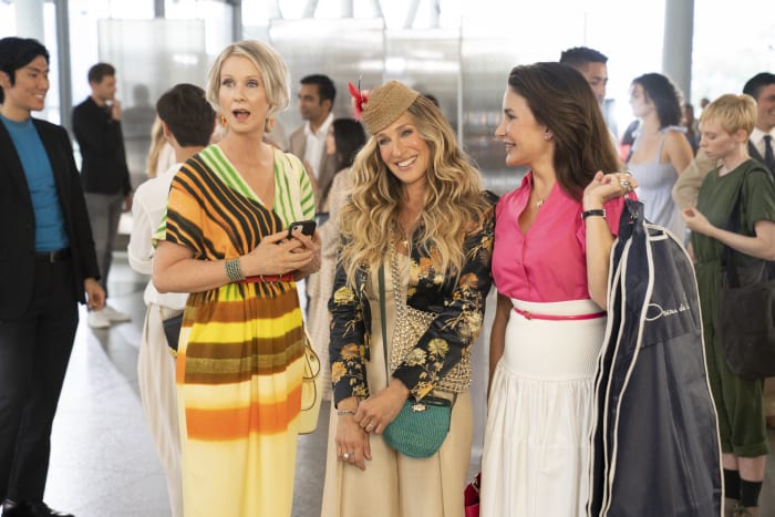 Miranda (Cynthia Nixon), Carrie (Sarah Jessica Parker, carrying the Paco Rabanne bag from above) and Charlotte (Kristin Davis) in 'And Just Like That.'