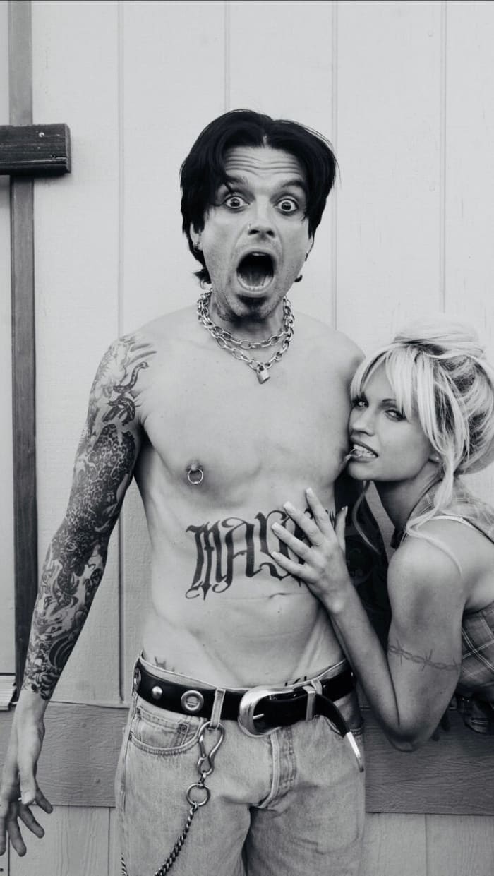 Sebastian Stan as Tommy Lee and Lily James as Pamela Anderson on set in 2021, breaking the Internet.