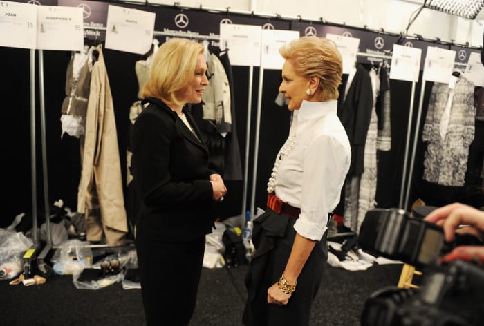 Senator Kirsten Gillibrand with designer Carolina Herrera at New York Fashion Week in 2012.