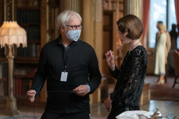 Director Simon Curtis and Michelle Dockery, in costume as Lady Mary.