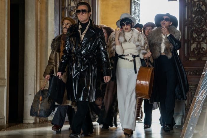 Joe, Halston, Pat Ast (Shawna Hamic, behind McGregor), Liza and Elsa enter Versailles.