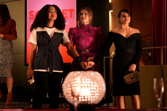 Kat in a Junya Watanabe top, Sutton (Meghann Fahy) in an Alessandra Rich dress and an Alexis Kirk belt with Jane (Katie Stevens) in a Brock Collection dress from Fall 2020.
