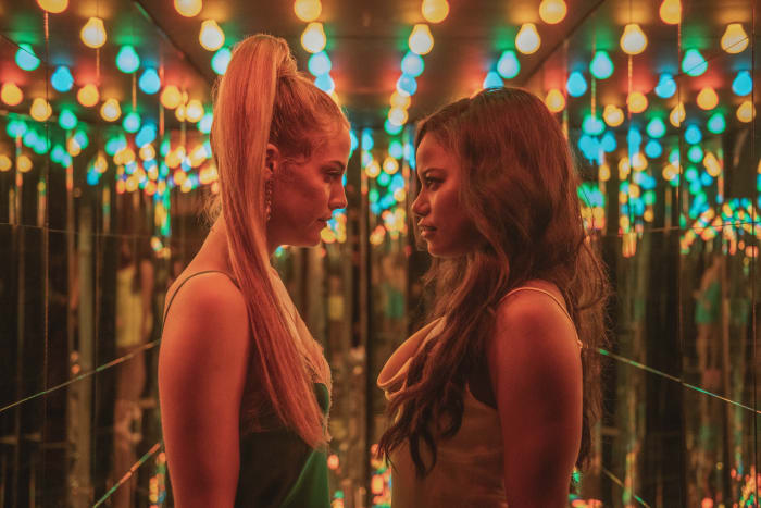 Stefani, in Fleur du Mal, bonding with Zola, in a custom-designed slip.