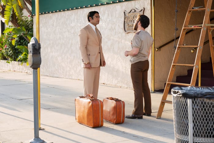 Steve (Kumail Nanjiani) chats with new handyman, Ray (Robin de Jesus).