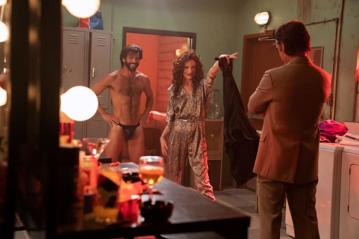 Denise (Juliette Lewis, center) unveils her 'gamechanging' breakaway pants idea to Nick, with dancer Richie (Michael Graceffa, left) as guinea pig.