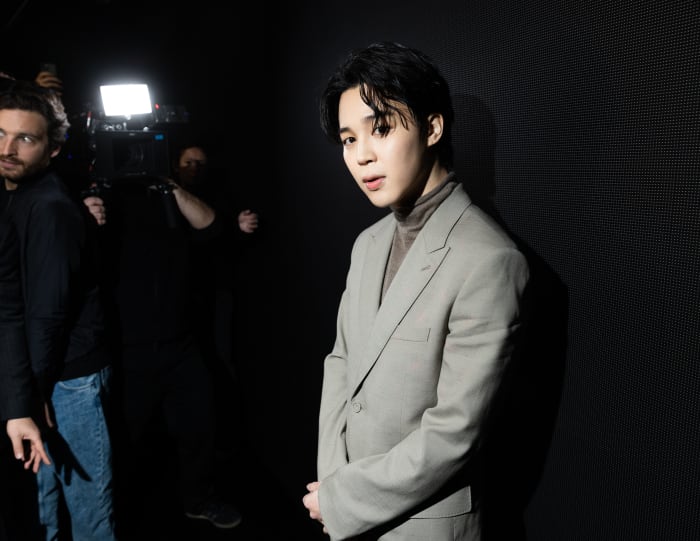 Jimin attends the Dior Homme Menswear Fall-Winter 2023-2024 show as part of Paris Fashion Week on January 20, 2023 in Paris, France.