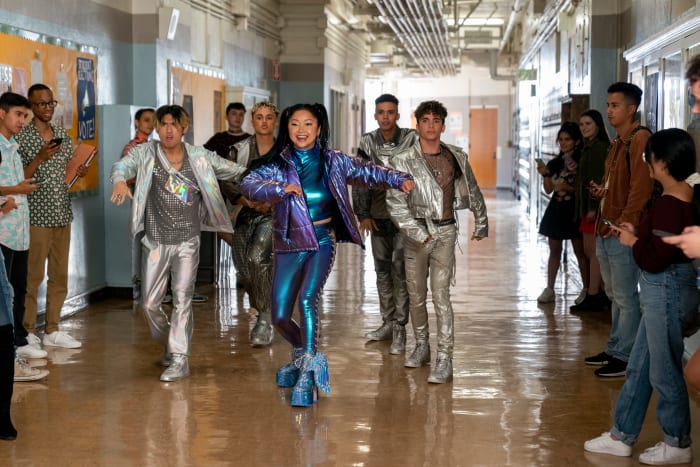Erika Vu (Lana Condor), in  getting her views and likes in 'Boo, Bitch.'