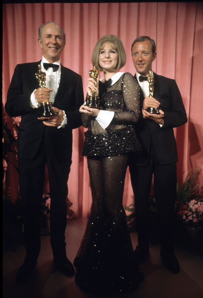 Barbra (center) poses with Jack Albertson (left) and Anthony Harvey (right),