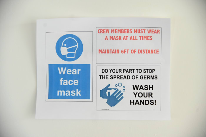 Signs were put up in Spring Studios detailing various Covid-19 safety precautions in September 2020, during the first New York Fashion Week following worldwide pandemic lockdowns.