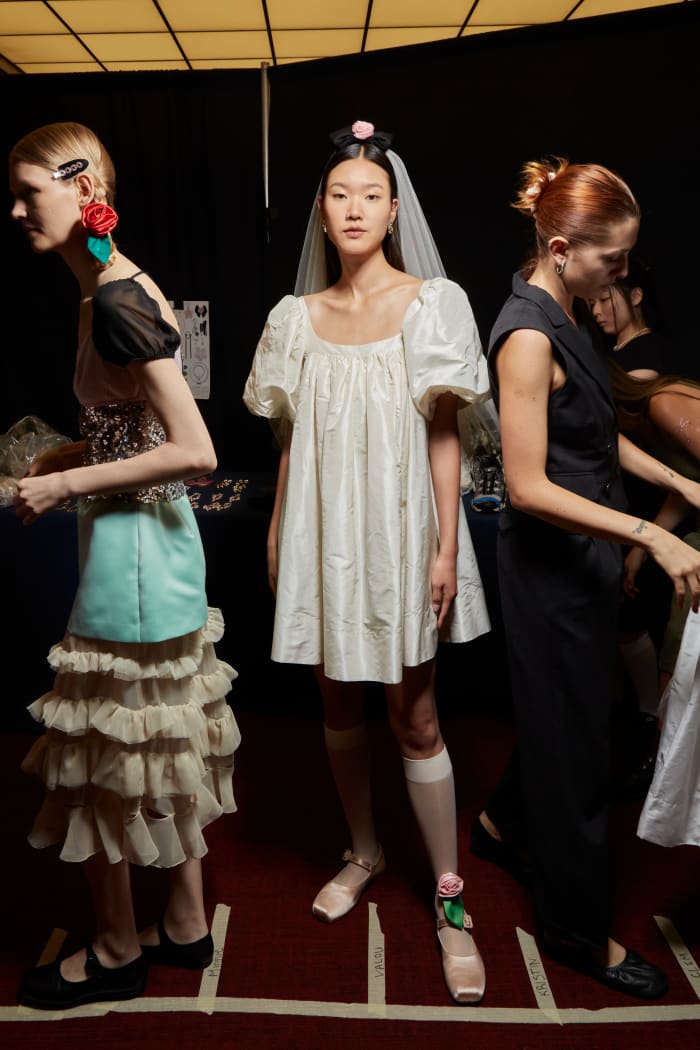 Models backstage at Sandy Liang's Spring 2023 show