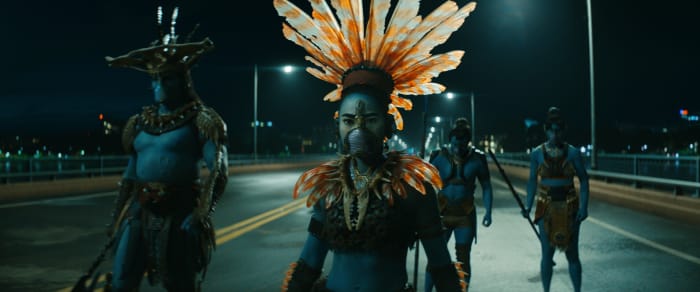 Attuma (Alex Livinalli, left) and Namora (Mabel Cadena, center) visit the surface world.