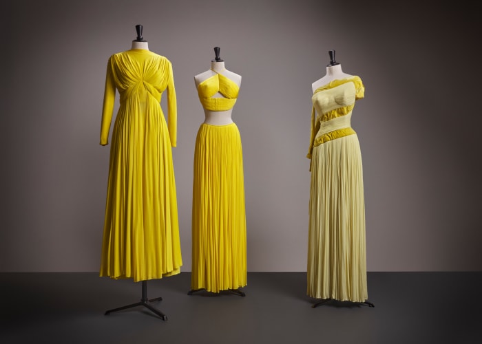 Bright and shining from the corner of the room, this trio of gowns flaunts the talent of Madame Grès across varying silhouettes.