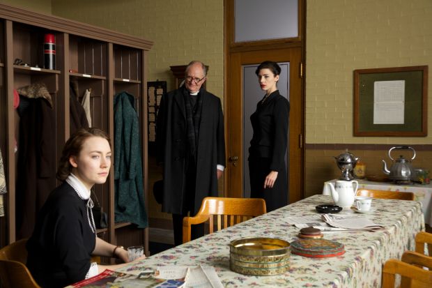 Jessica Paré as Miss Fortini looks on at her young employee. Photo: Kerry Brown/Twentieth Century Fox Film Corporation