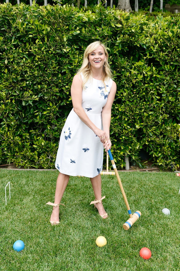 Reese Witherspoon "playing croquet" at a lunch to celebrate Draper James's collaboration with Net-a-Porter. Photo: Stefanie Keenan/Getty Images