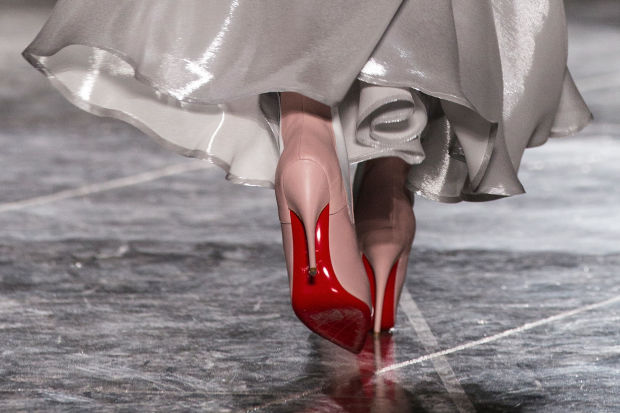 A signature pair of Christian Louboutin red soles. Photo: Tristan Fewings/Getty Images