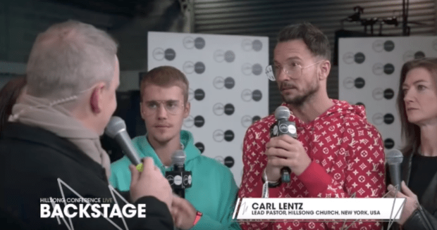 Justin Bieber with Carl Lentz, shown wearing the buzzy Louis Vuitton x Supreme collaboration. Photo: Screenshot/YouTube