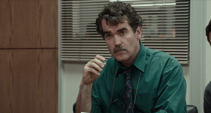 Props to the prop coordinator for all the spectacular spectacles in this film, including the ones hanging around d'Arcy James's neck here. Screengrab: Open Road Films