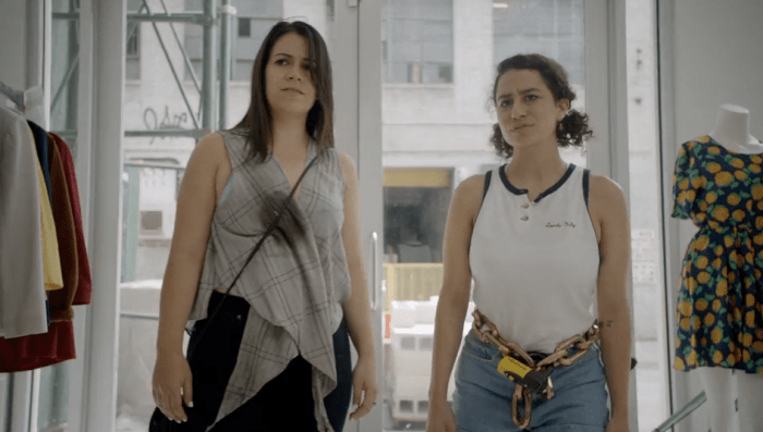 Abbi and Ilana hit up a sample sale to find a gallery-appropriate outfit. Screengrab: Comedy Central