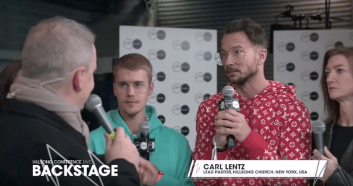 Justin Bieber with Carl Lentz, shown wearing the buzzy Louis Vuitton x Supreme collaboration. Photo: Screenshot/YouTube