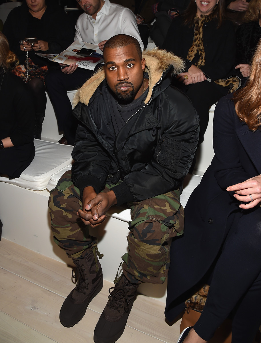 Kanye West, front row at Fashion Week. Photo: Mike Coppola/Getty Images