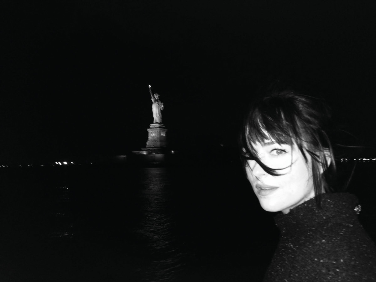 Dakota Johnson on a boat, New York. Photo: Alexa Chung/Paper