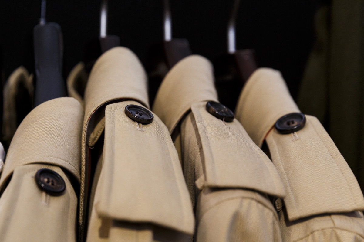 Burberry trenches backstage at a runway show. Photo: Tristan Fewings/Getty Images