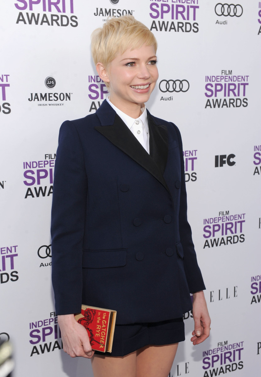 Michelle Williams carrying an Olympia Le-Tan clutch. Photo: Dimitrios Kambouris/Getty Images