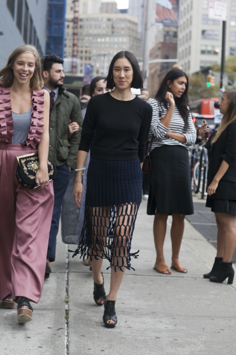 Chloe King in Audra and Eva Chen in Whistles top, Rosetta Getty skirt and Proenza Schouler shoes. Photo: Emily Malan/Fashionista