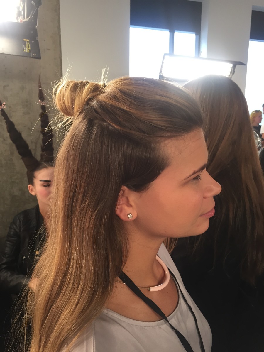 Essie manicurist Julie Kandalec backstage at NYFW, doing her job and sporting the hottest hair trend this season. Photo: Cheryl Wischhover/Fashionista