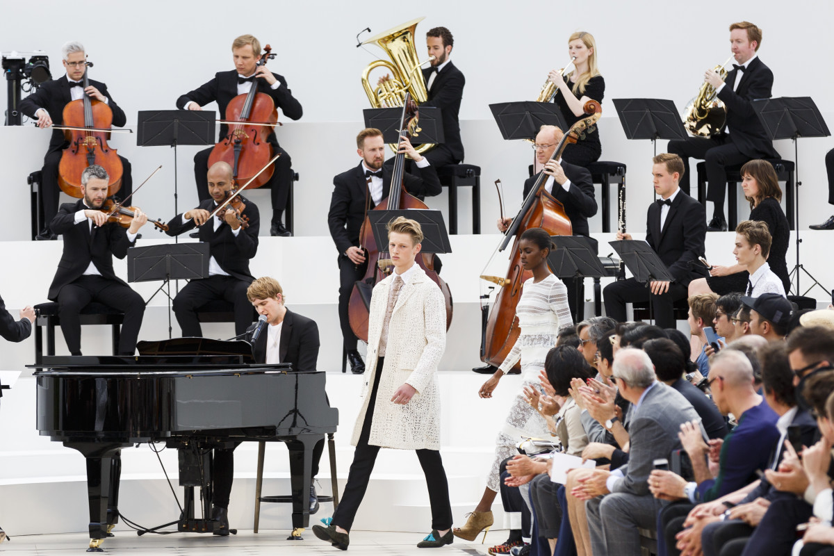 Burberry models walked the runway in front of a live orchestra at the brand's menswear show in June. Photo: Tristan Fewings/Getty Images