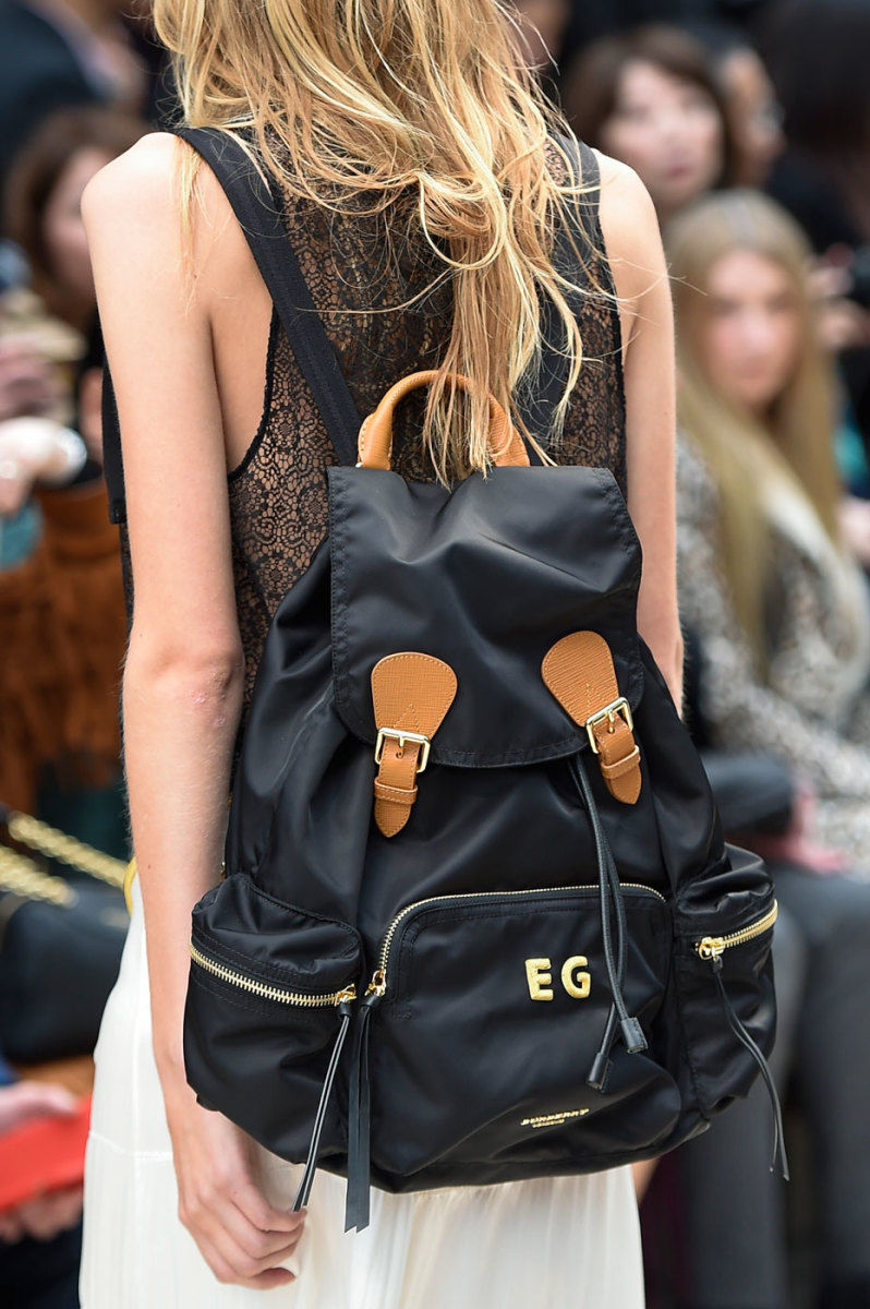 Burberry models carried monogrammed backpacks at Monday's show, which were available for pre-order immediately after the live-stream ended. Photo: Imaxtree