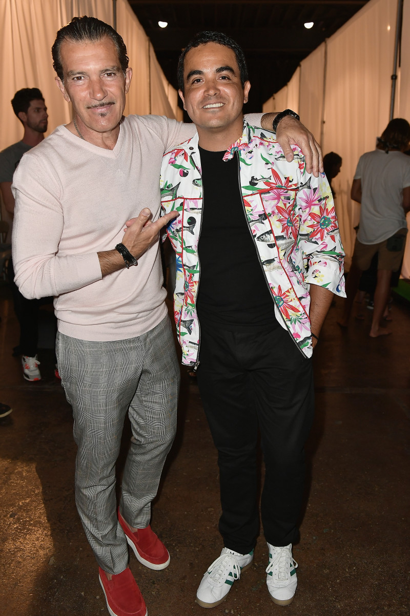Antonio Banderas in a daughter-approved outfit backstage at Miami Fashion Week with designer Yirko Sivirich. Photo: Gustavo Caballero/Getty Images