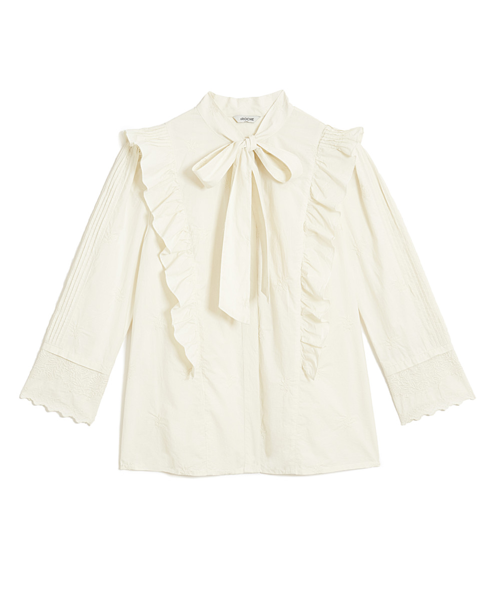 Emily blouse, $265, available at St. Roche.