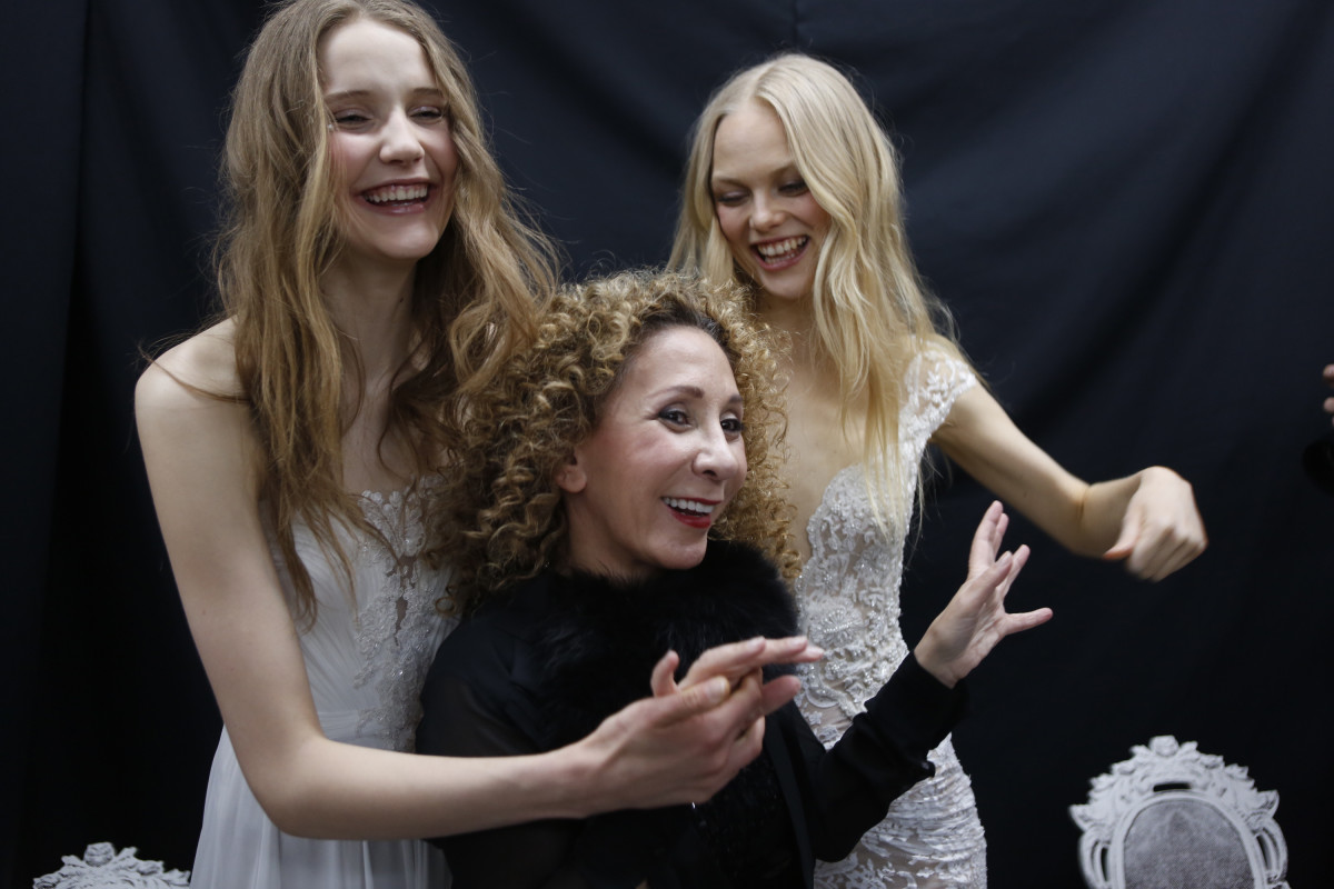 Acra chilling with the models backstage before her spring 2017 bridal runway show. Photo: Thos Robinson 