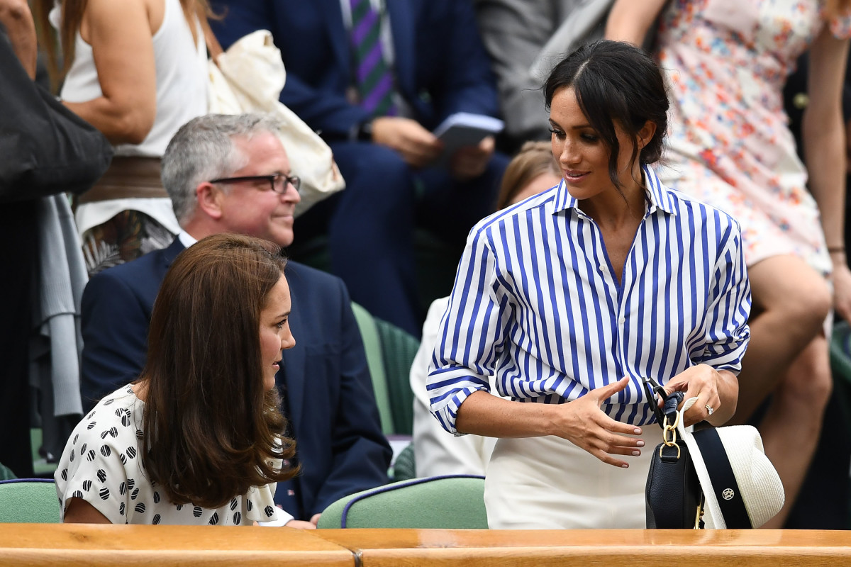 Catherine, Duchess of Cambridge, and Meghan, Duchess of Sussex, at Wimbledon in London. Photo: Clive Mason/Getty Images