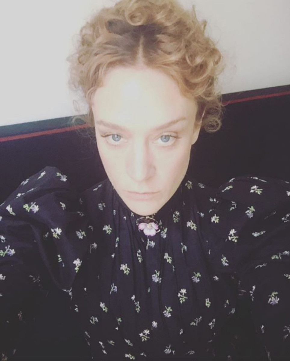 Chloë Sevigny snaps a selfie of herself in Lizzie Borden costume, including the pansy pin, on the set of 'Lizzie.' Photo: Instagram/@chloessevigny