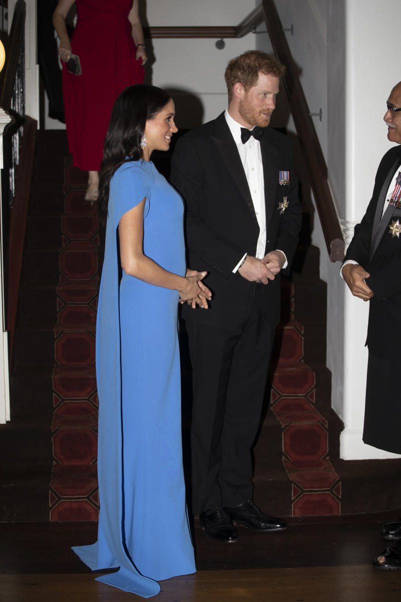 Meghan Markle in Safiyaa and Prince Harry at a state dinner in Suva, Fiji. Photo: Ian Vogler - Pool/Getty Images