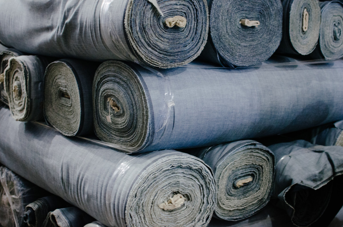 Denim rolls waiting to be cut and sewn. Photo: Whitney Bauck/Fashionista