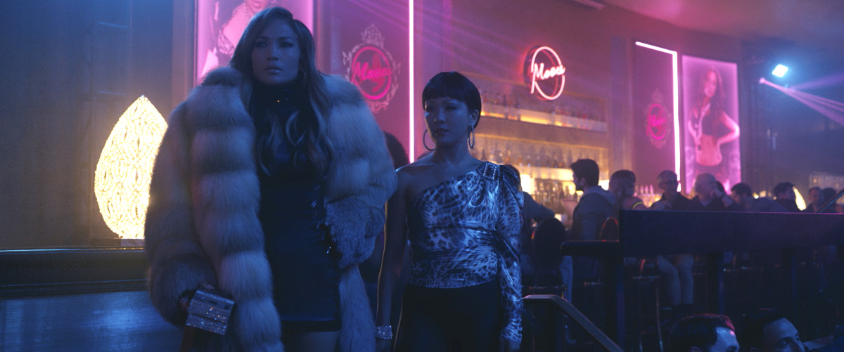 Ramona in a Marc Kaufman Furs coat and The Blonds dress and carrying a Judith Leiber clutch. Destiny in a bebe top and vintage leather pants. Photo: Courtesy of STXfilms