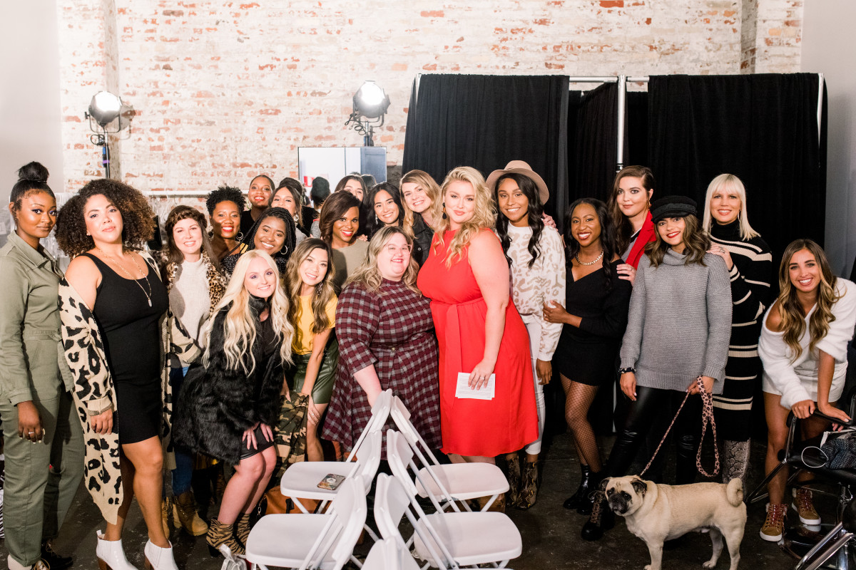 Hunter McGrady (in red, center right) at DSW’s Inclusive Runway Redone Show with Create & Cultivate at Industria backstage with the models in the show. Photo: Smith House Photo/Courtesy of Create & Cultivate