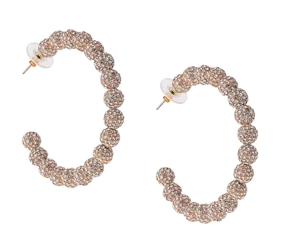 Lele Sadoughi Slim Stardust Hoop Earrings, $245, available here.