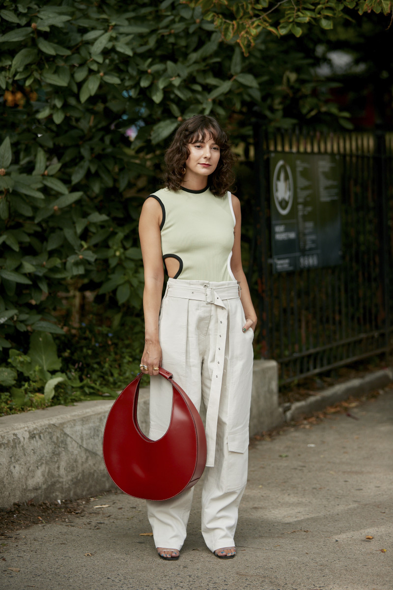Alyssa Coscarelli carrying Staud's Moon bag during New York Fashion Week in September 2019.