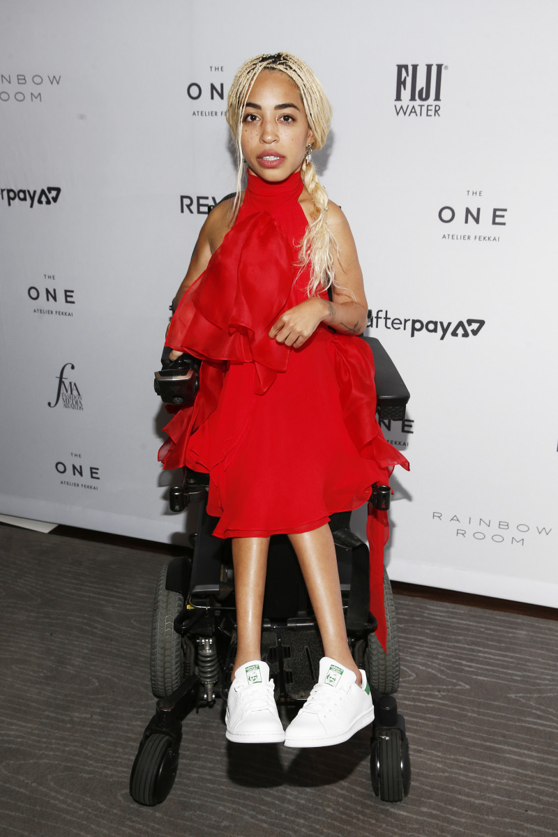Mercado at the 2019 Daily Front Row Fashion Media Awards, wearing Redemption Official and Adidas. 