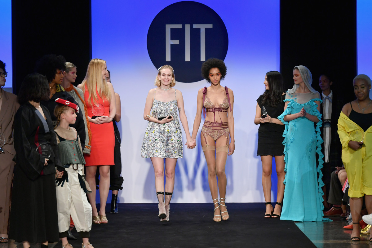FOF Critic Award winner Kaitlin Barton walks the runway with a model during the 2018 Future of Fashion Runway Show. Photo: Slaven Vlasic/Getty Images for FIT