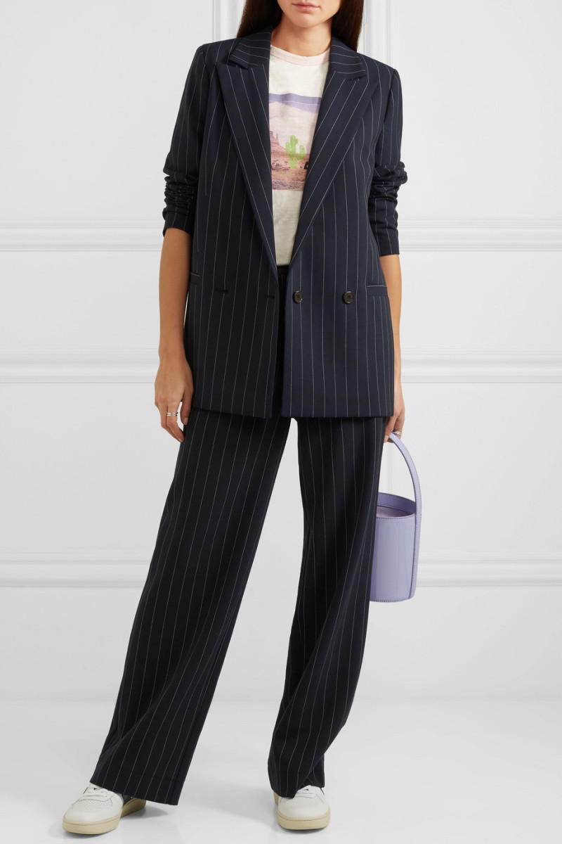 Ganni Hewitt Pinstriped Cady Blazer, $360, available here, and Hewitt Pinstriped Cady Straight-Leg Pants, $250, available here.