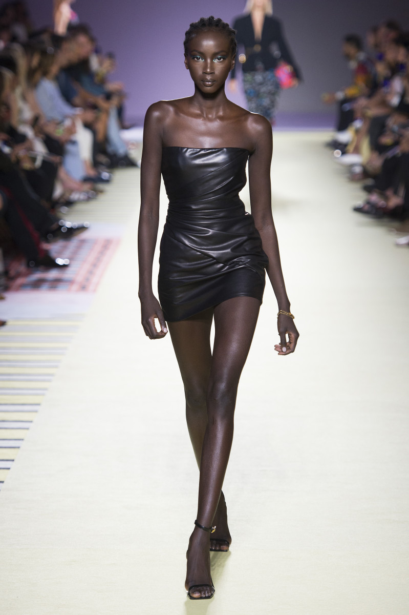 https://fashionista.com/.image/t_share/MTYxNjk2MDgyMzgyODI0NzUw/anok-yai-versace-leather-dress-spring-2019-milan-fashion-week.jpg