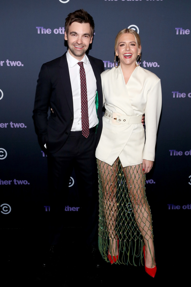 Yorke, with Drew Tarver, who plays Brooke's brother, Cary on 'The Other Two,' in a Rachel Comey dress and Steve Madden heels at the premiere of 'The Other Two.' 'I don't want to poop on them, but Louboutins are expensive and uncomfortable. They're so deeply uncomfortable, it's psychotic,' says Yorke, about buying affordable footwear. Photo" Astrid Stawiarz/Getty Images for Comedy Central