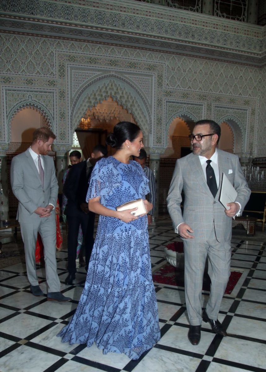 The Duchess of Sussex in Carolina Herrera with the King of Morocco. Photo: @KensingtonRoyal/Twitter