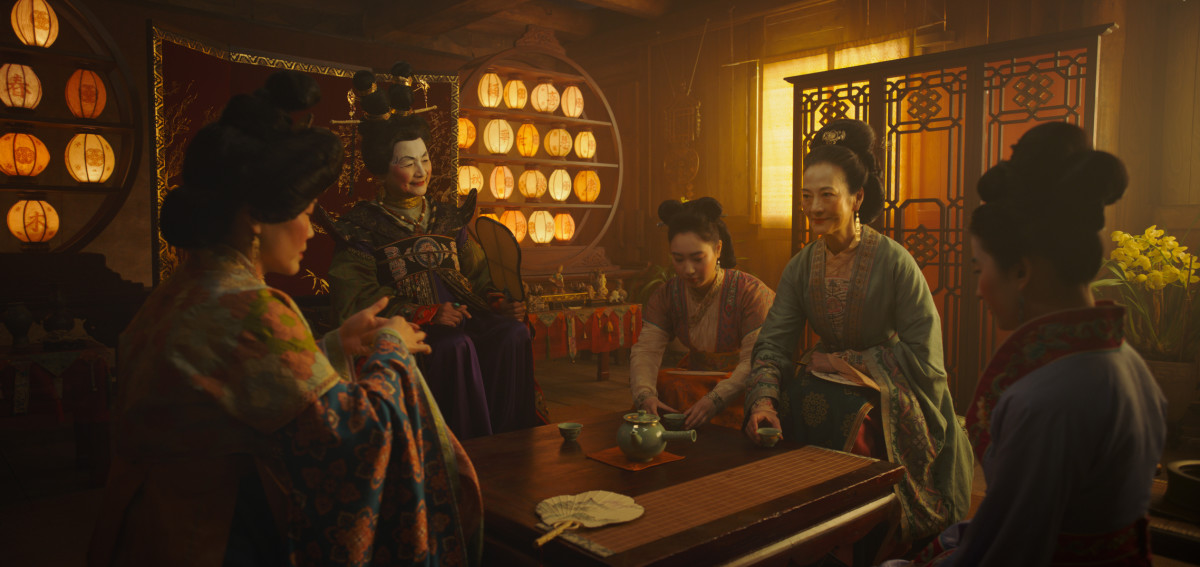 L—R: Groom's mother, the Matchmaker (Pei-Pei Cheng), little sister Xiu (Xana Tang), Wuwei (Rosalind Chao) and Mulan.